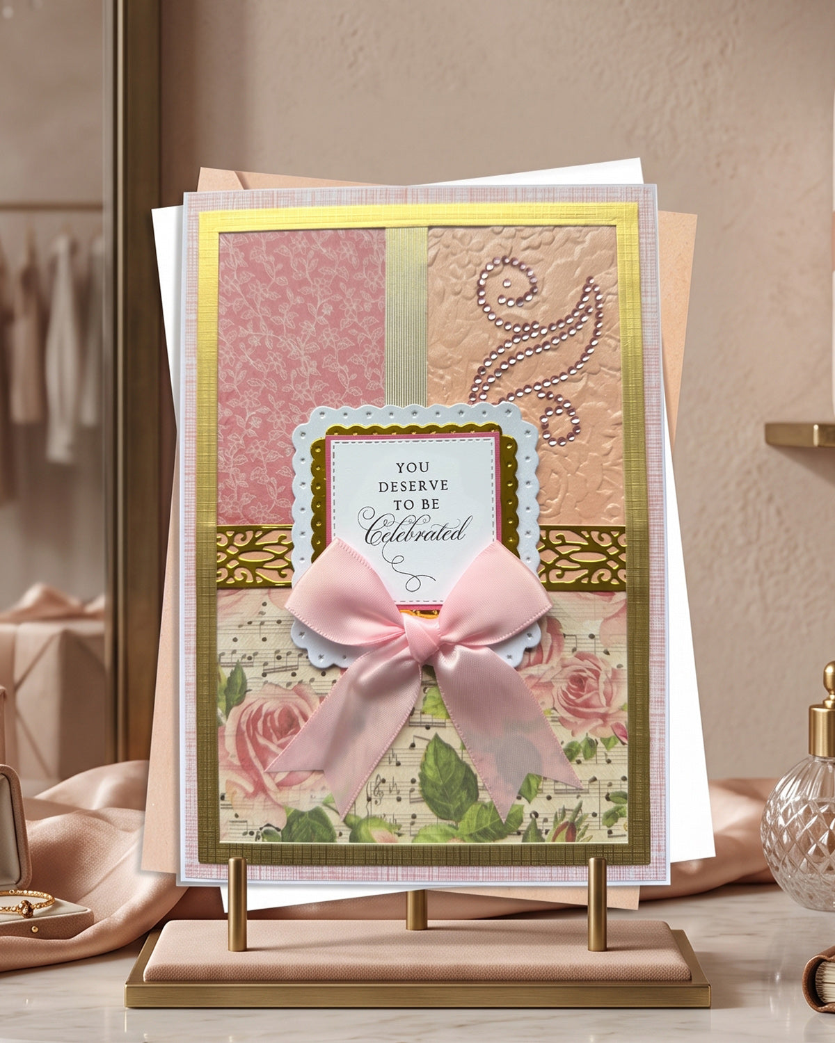 A beautiful handmade card saying You Deserve to be Celebrated - made in NZ by Del Cards NZ.