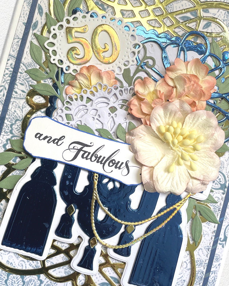 Detail shot of luxury handmade 50th milestone birthday card by Del Cards NZ, premium layered papers and fine gems