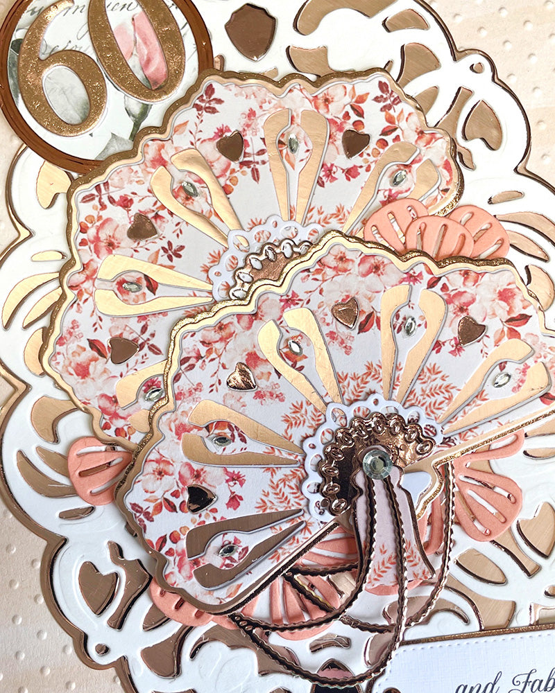 Detail shot of luxury handmade 60th milestone birthday card by Del Cards NZ, premium layered papers and fine gems