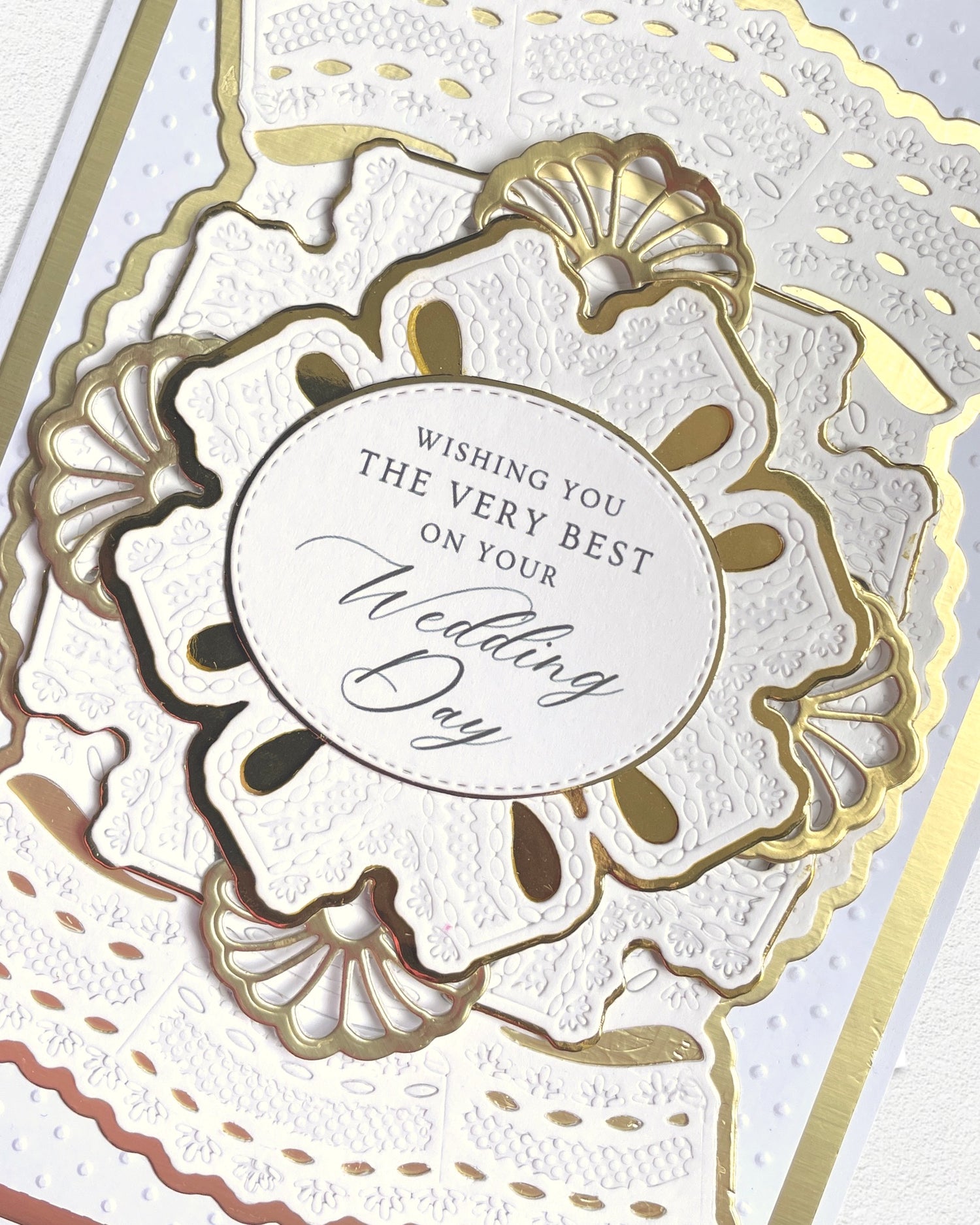 Detail shot of luxury handmade wedding card by Del Cards NZ, fine gems and elegant layered papers