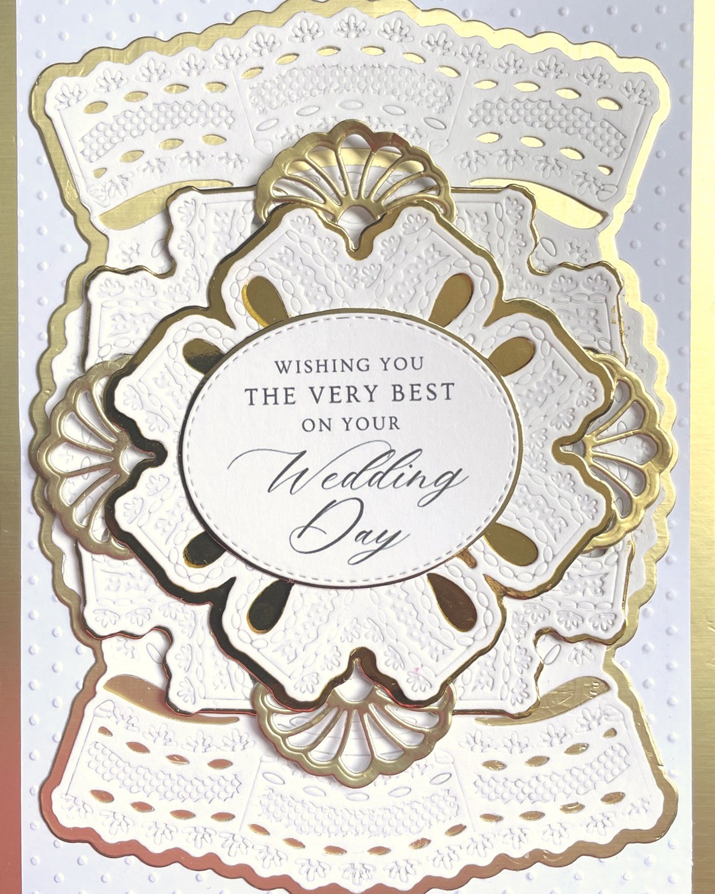 Detail shot of luxury handmade wedding card by Del Cards NZ, fine gems and elegant layered papers