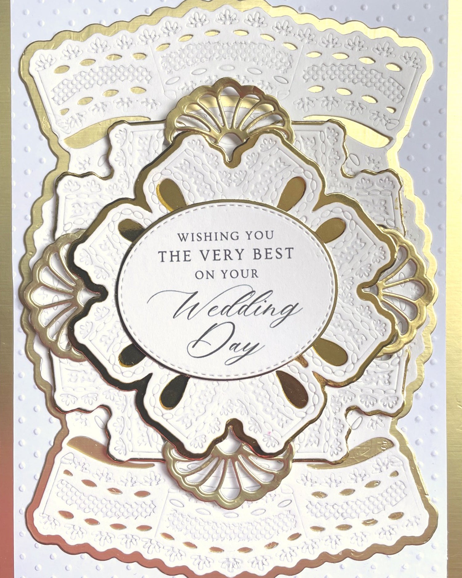 Detail shot of luxury handmade wedding card by Del Cards NZ, fine gems and elegant layered papers