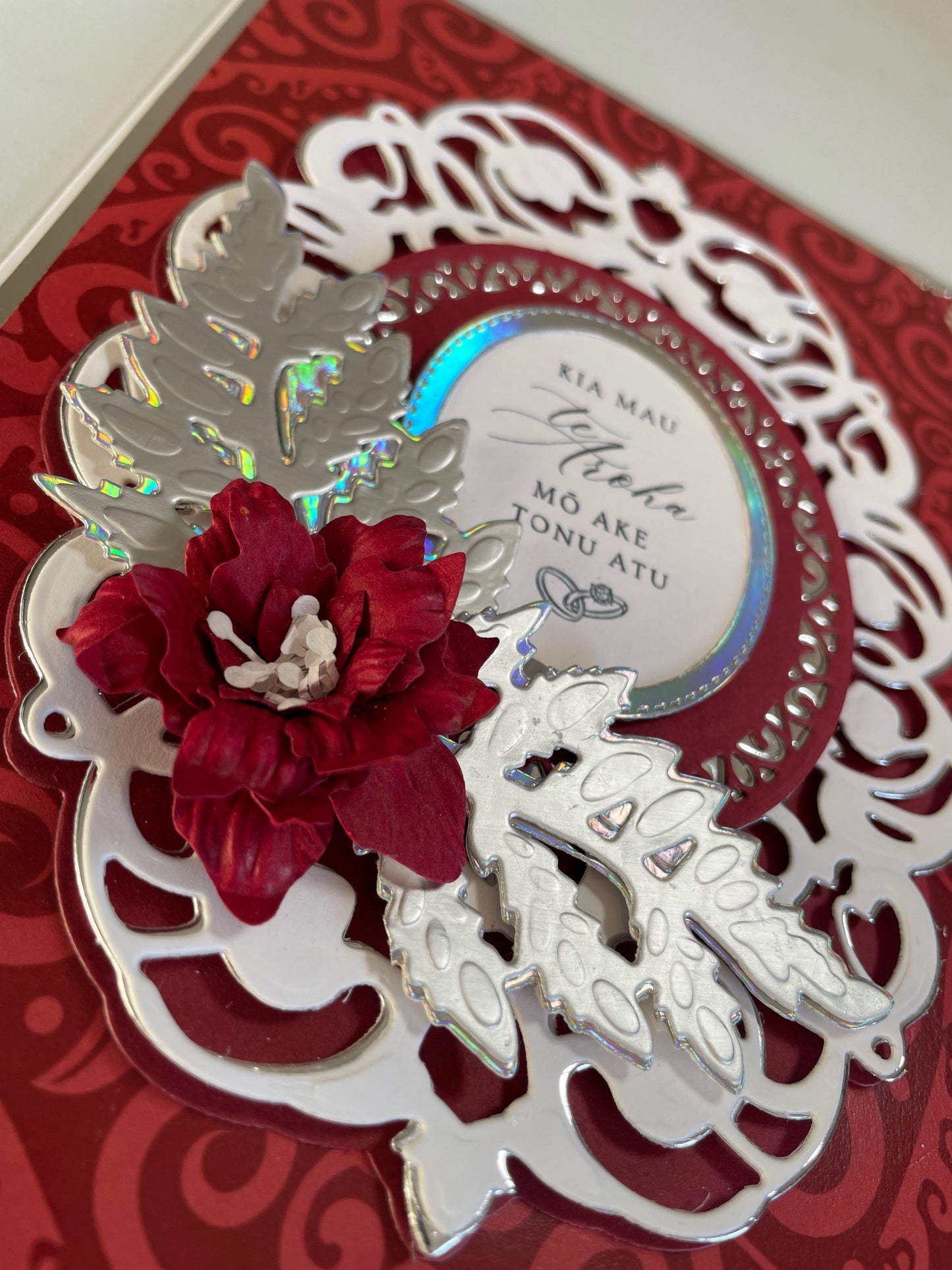 Luxury Handmade Māori Wedding Card – Silver Embossed with Handmade Paper Flowers