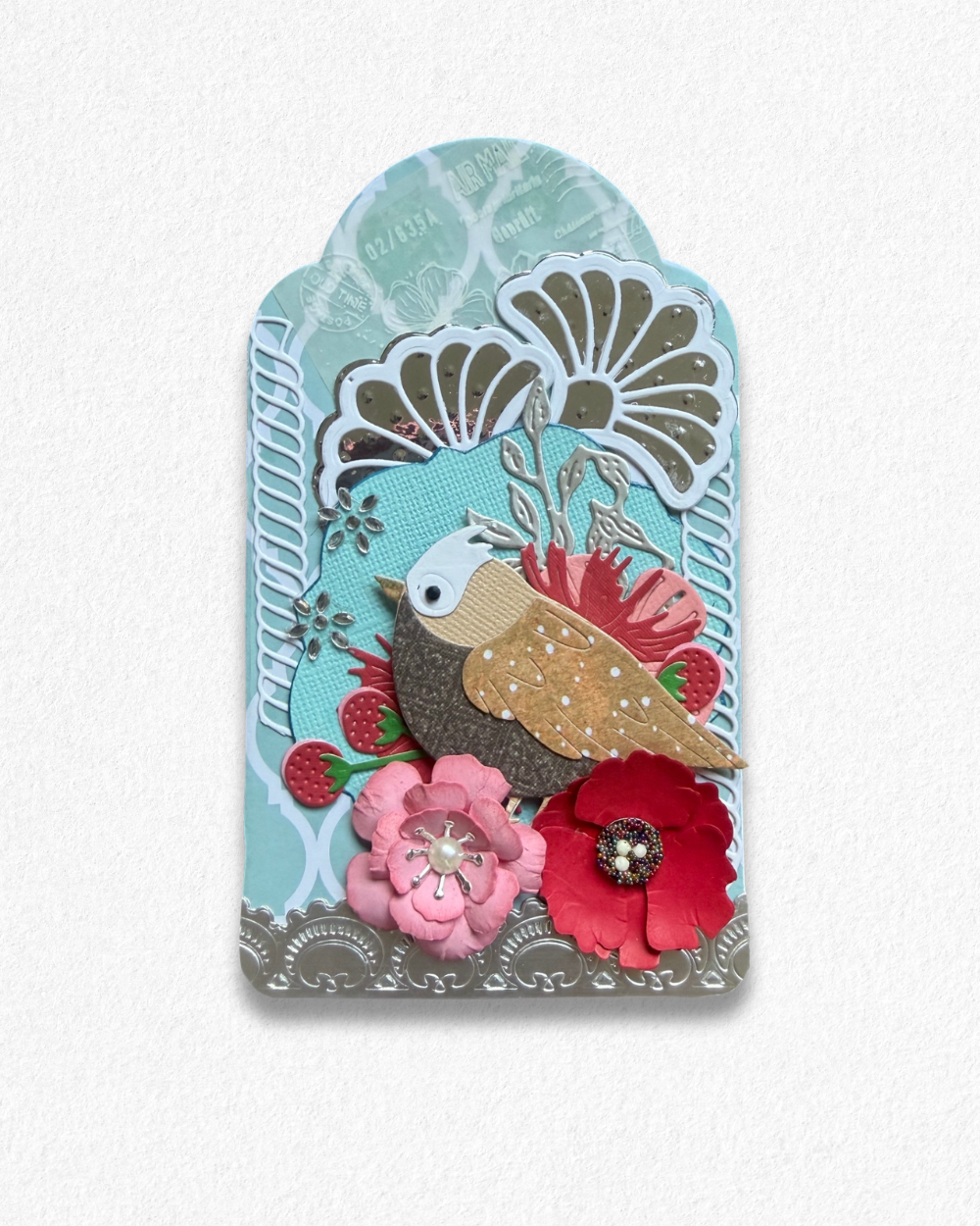 Handmade mini card by Del Cards NZ featuring a die-cut bird with floral details on a mint striped background.