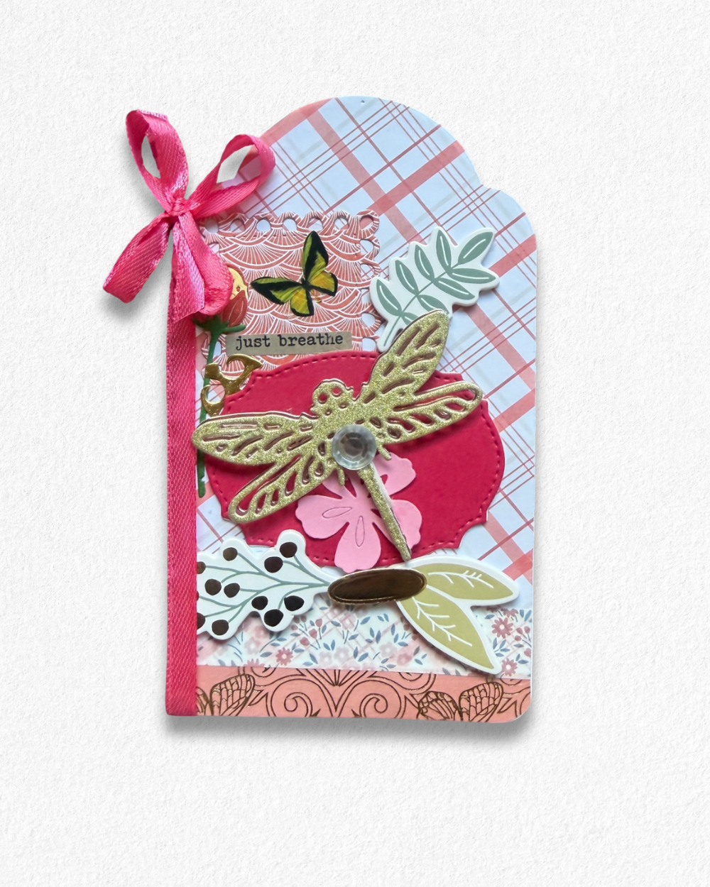 Handmade mini card by Del Cards NZ featuring a die-cut bird with floral details on a mint striped background.