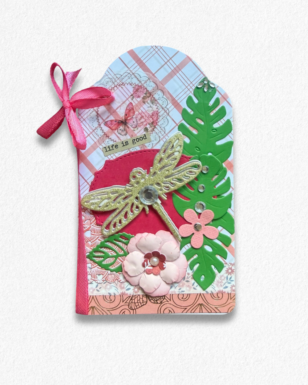 Handmade mini card by Del Cards NZ featuring a die-cut bird with floral details on a mint striped background.