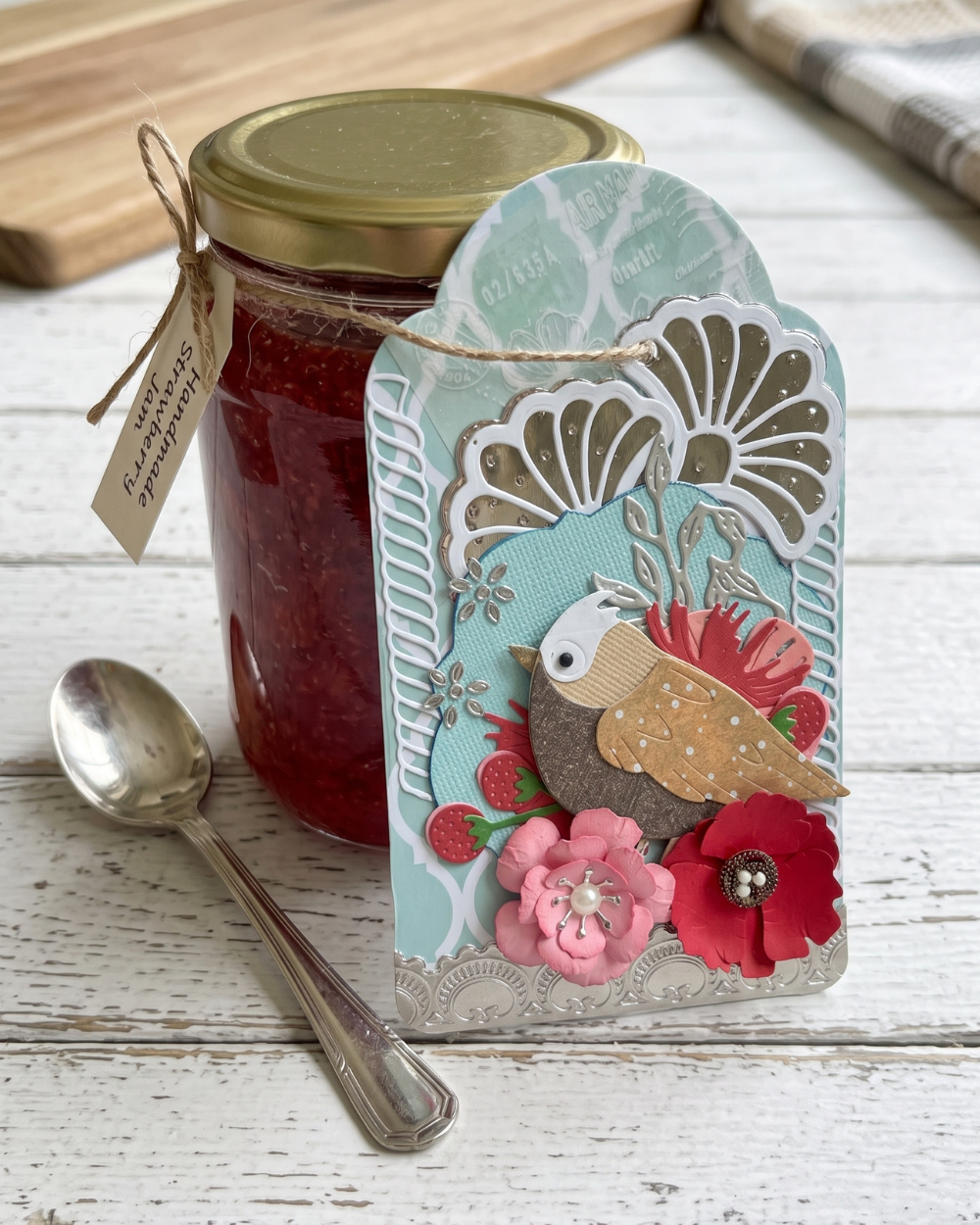 Handmade mini card by Del Cards NZ by side of a strawberry jam. For sale by Del.