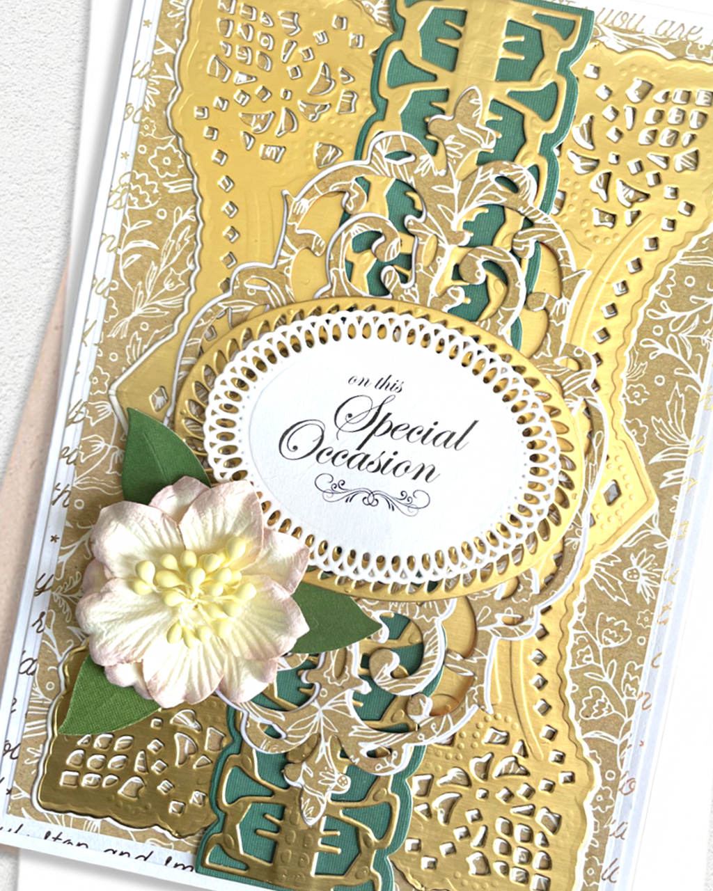Detail shot of luxury handmade greeting card by Del Cards NZ, premium layered papers and fine gems