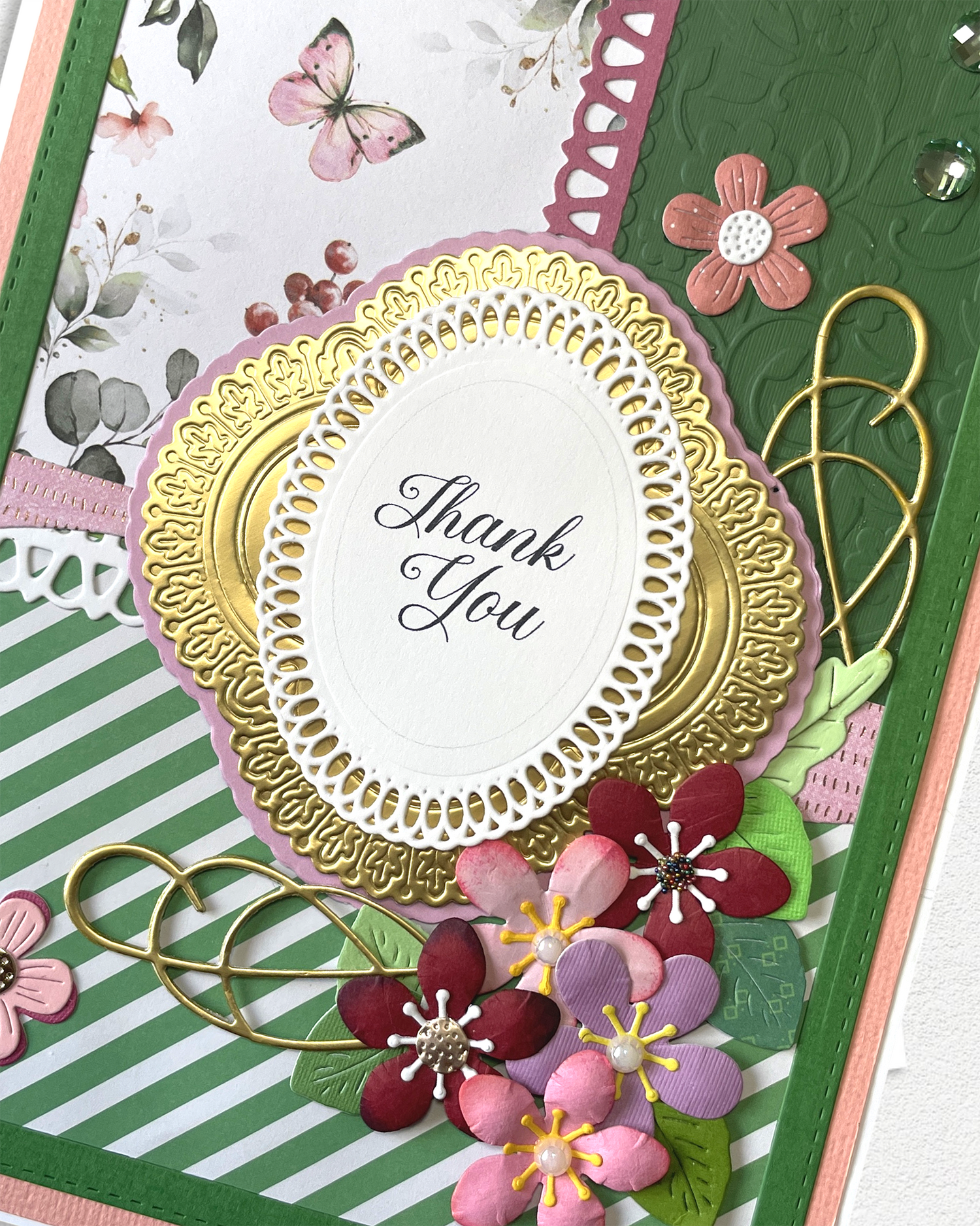 A luxury handmade thank you card with layered paper flowers in soft blush tones. Made by hand in New Zealand.