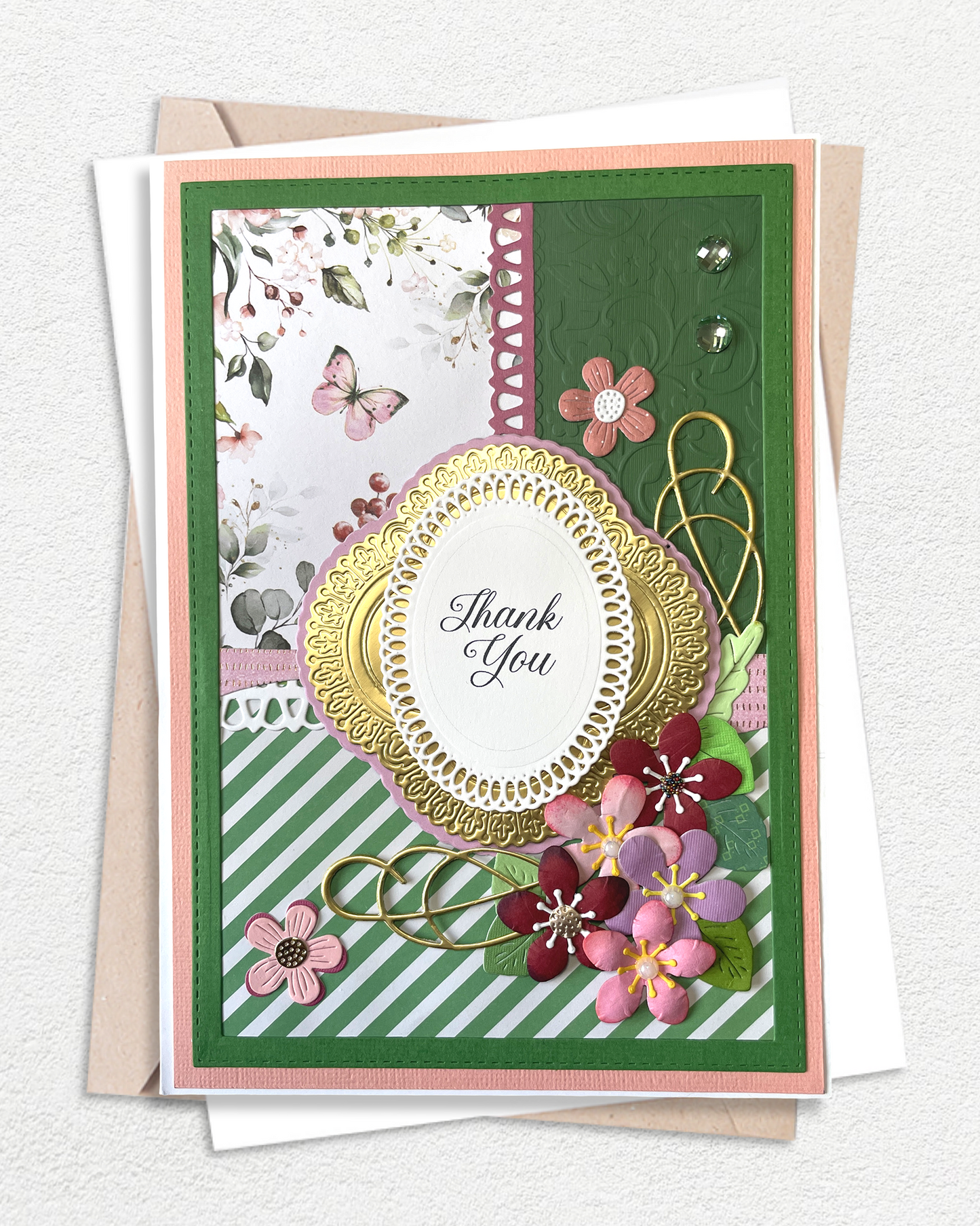 A luxury handmade thank you card with layered paper flowers in soft blush tones. Made by hand in New Zealand.