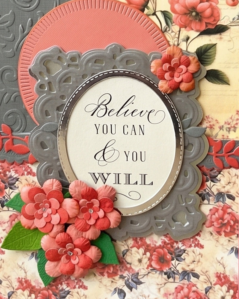 Full front view of a handmade coral and charcoal encouragement card featuring a vintage floral background, large embossed grey decorative frame, cream oval sentiment of encouragement and hand-crafted coral paper florals. A heartfelt handmade card made in New Zealand by Del.