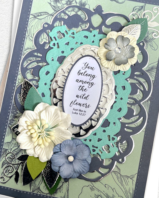 Close-up of layered teal and navy die-cut frame on luxury handmade Christian greeting card