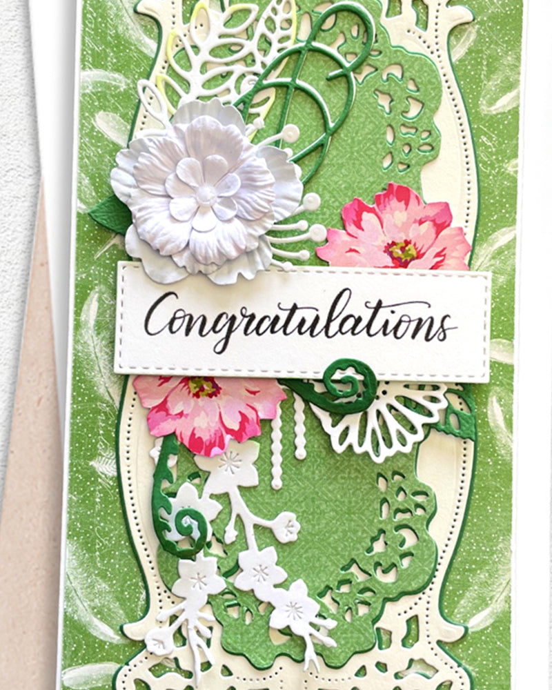 Detail shot of handmade congratulations card by Del Cards NZ, premium layered papers and fine embellishments