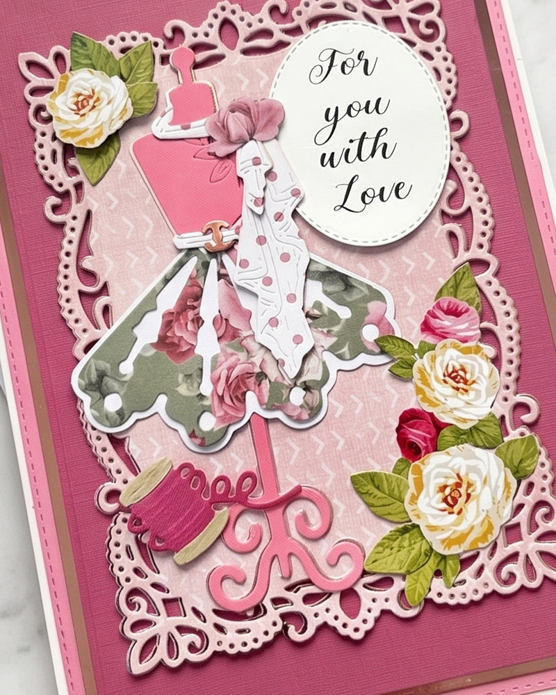 Full front view of a handmade deep rose pink greeting card featuring an ornate white lace die-cut border, elegant ball gown lady figure, hand-applied cream and pink paper roses and a "For you with Love" circular sentiment tag. A romantic, feminine handmade card made in New Zealand by Del Cards.

