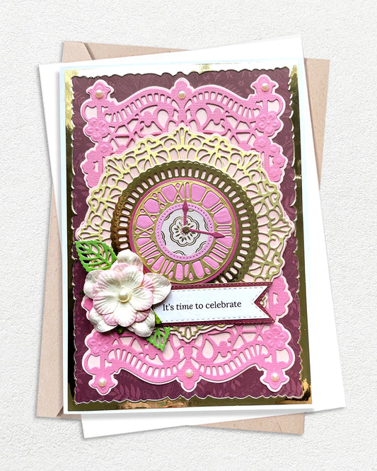 Decorative greeting card with intricate designs and a floral element on a white background