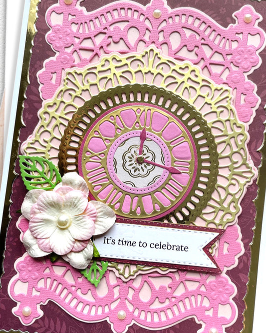 Decorative card with floral design and text 'It's time to celebrate' on a pink and purple background.