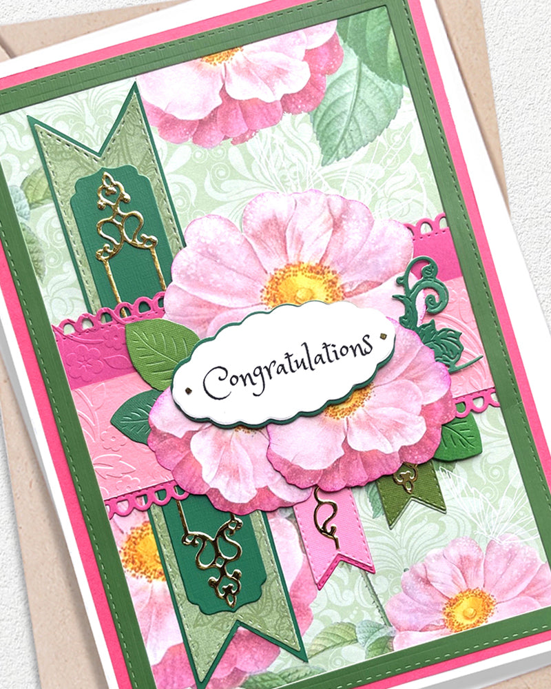 Greeting card with pink flowers and 'Congratulations' text on a white background, made in NZ.