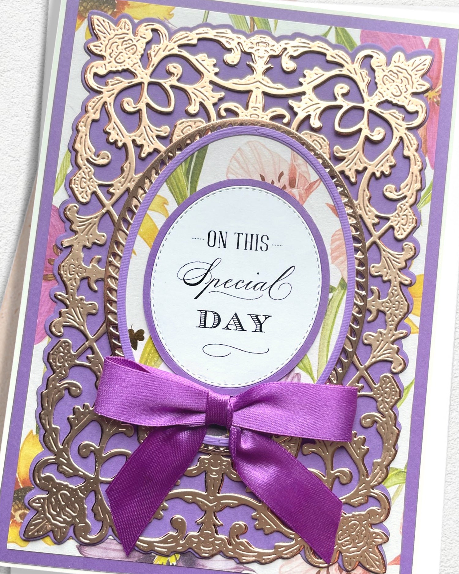 Detail shot of luxury handmade greeting card by Del Cards NZ, intricate layered papers and premium materials