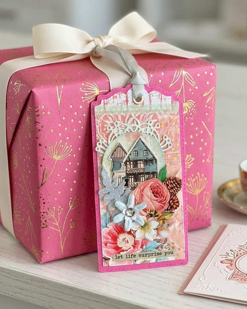 Luxury handmade gift tag styled on a hot pink gift box with white satin bow — Del Cards NZ handmade gift tags add a personal and memorable finishing touch to any gift