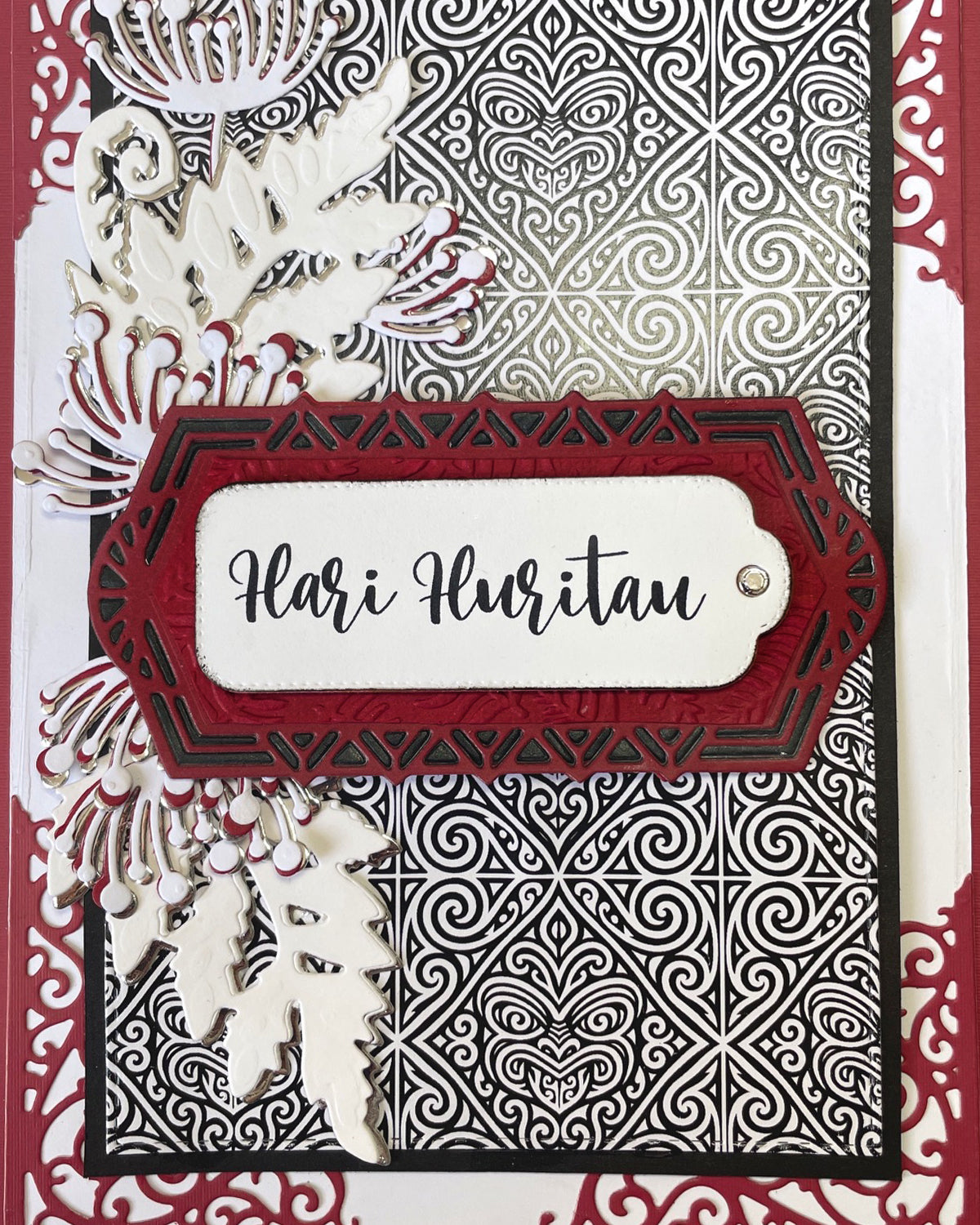Detail shot of luxury handmade Māori birthday card by Del Cards NZ, unique design with premium embellishments