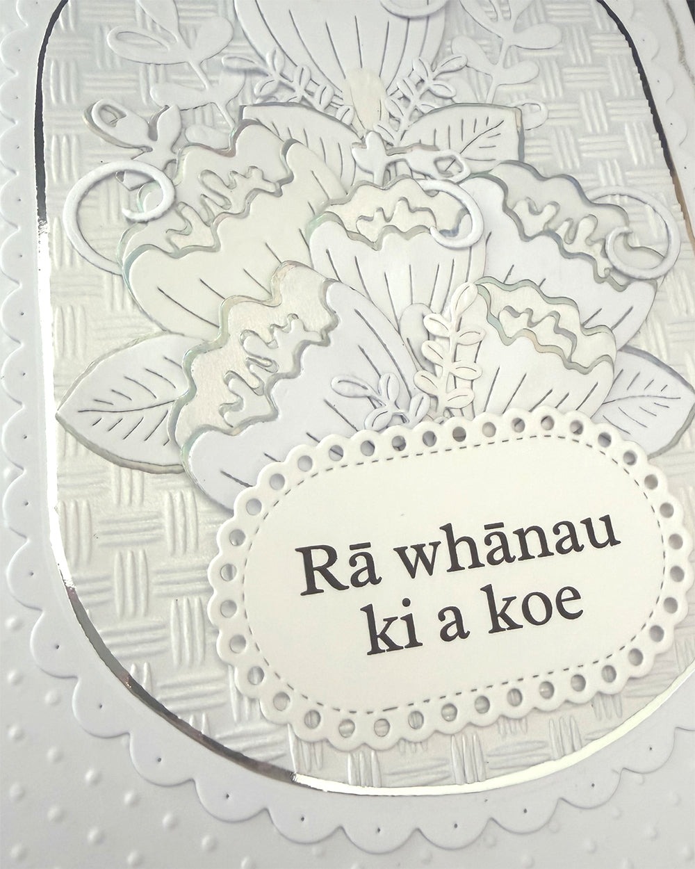 Details of a greeting card with Maori Sentiment, ra whanau ki a koe, happy birthday