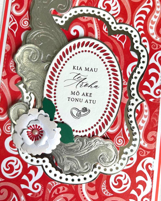 Details of luxury handmade Māori wedding card by Del Cards NZ, fine gems and elegant traditional patterning