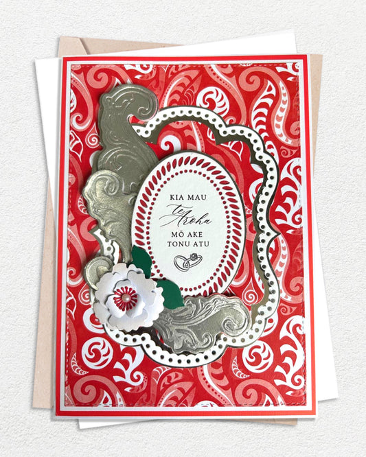 Luxury handmade Te Reo Māori wedding card with red and black traditional design, made in Auckland New Zealand — May your Love Last Forever