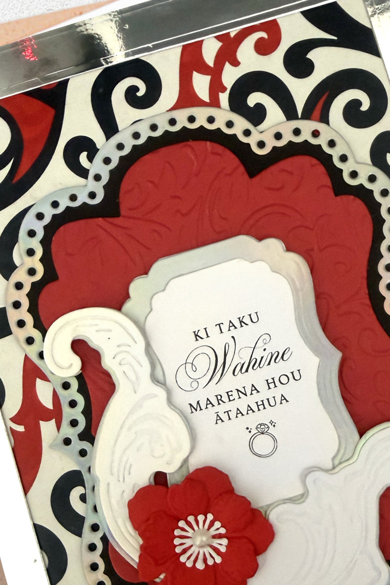Details of luxury handmade Māori wedding card by Del Cards NZ, decorative floral design with traditional Māori patterning