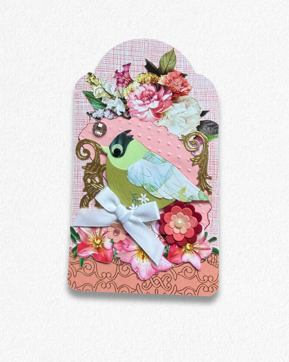 Handmade mini card by Del Cards NZ featuring a die-cut bird with floral details on a mint striped background.