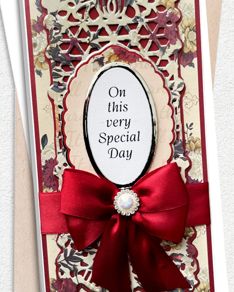 Decorative card with a red bow and text 'On this very Special Day' on a white background