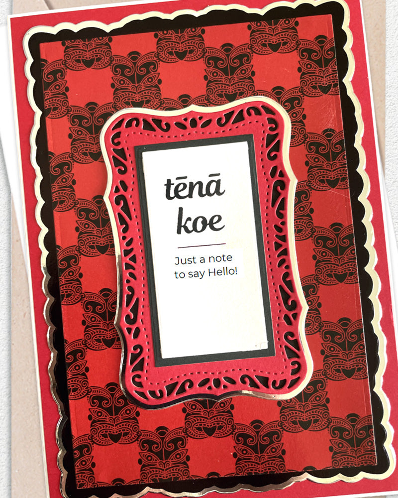 Detail shot of handmade Māori greeting card by Del Cards NZ, warm and elegant design with premium materials