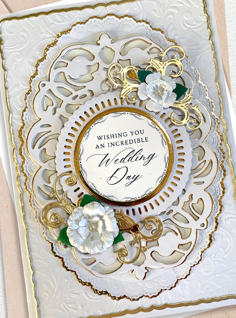 Luxury handmade wedding card by Del Cards NZ, premium layered papers and fine gems