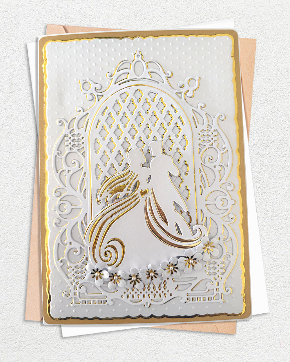 Handmade wedding congratulations card with gold foil lace border and die-cut bride and groom silhouette, blush envelope, by Del Cards NZ