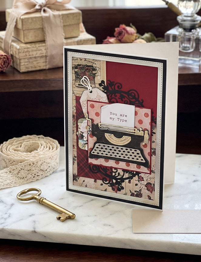 Decorative greeting card with typewriter design on a marble surface with decorative items, made in NZ by Del Cards NZ.